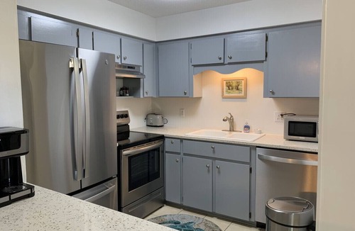 Demere Park Condo | O1 Two BR townhome in Ocean Walk with 1 king, 1 queen bed. Recently updated.