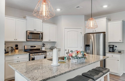 Ocean View House | Ocean View Beach Club home with bay view, private tennis court & pool access