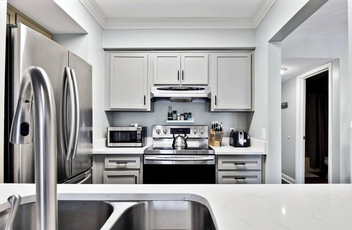 East Beach Condo | Oceanfront Condo - Private Boardwalk - Pool & Balcony