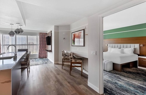 Las Vegas Hotel | Perfect Vegas Suite with Outdoor Pool Access for Relaxation | 2 Family Suites