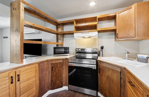 Ocean Cay Apartment | Pet-Friendly 1BR Condo Steps to Beach Outdoor Space + Partial View Upstairs