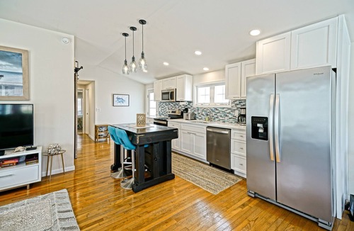 Milford House | Pets Welcome! Modern Cottage + Screened-In Deck, Steps from the Beach