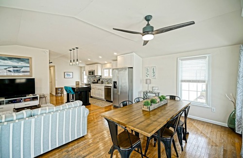 Milford House | Pets Welcome! Modern Cottage + Screened-In Deck, Steps from the Beach