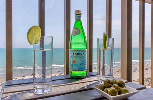 Downtown Myrtle Beach Condo | Pink Surf by StayMareni - Oceanfront 2 Queens Suite