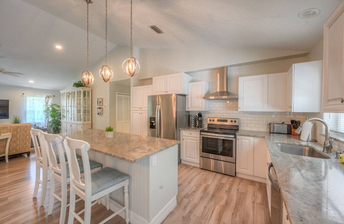 Naples Park House | Pool/Spa Home biking distance to the beach!