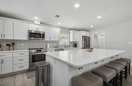 Westchase House | Private Lakefront Retreat with Heated Pool, Dock & Kayaks Near Tampa