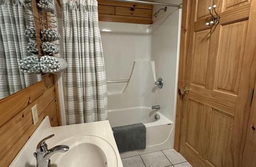 Potsdam House | Private Riverfront Cabin with Waterfalls on the St. Regis River, New York