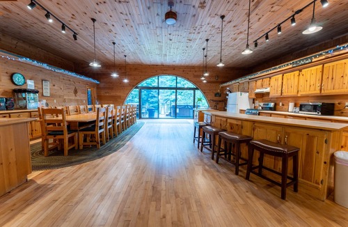 Rapid River House | Rapid River Lodge: Ease into Summer – Relax by the River!