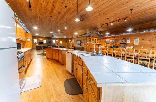 Rapid River House | Rapid River Lodge: Ease into Summer – Relax by the River!