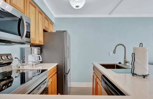 Rocky Point Condo | Relax 10ft from the Bay! Enjoy sunsets on balcony!