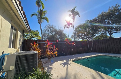 Poinsettia Heights House | Relaxing private entrance suite in pool home