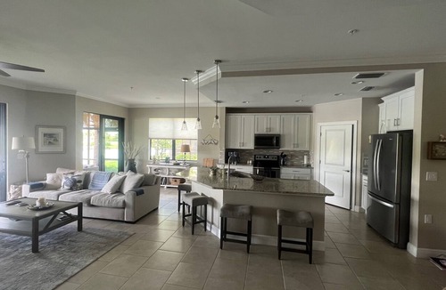 Pelican Preserve Condo | Resort Style 55+ Community! Includes golf cart and amazing sunset views!