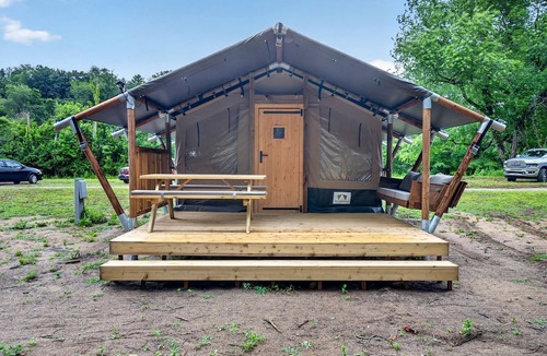 New River RV Rental | Riverfront Safari Tent with Scenic Views and Deck in Blacksburg, Virginia