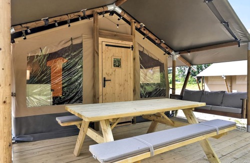 New River RV Rental | Riverfront Safari Tent with Scenic Views and Deck in Blacksburg, Virginia