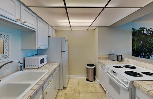 Villa Sabine Condo | Sabine Yacht & Racquet #2B | Bayfront, Pool Views!