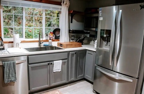 Skagit County Cabin | Secluded Forest Cabin w/Hot Tub & Private Waterfall