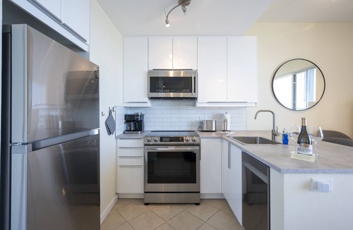 St. Petersburg Condo | See dolphins from the balcony! Hot tub and pool. Renovated & fully equipped.#410