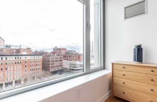 Chinatown Apartment | Sleek Downtown 1BR w/W/D in unit, Gym, Doorman by Blueground