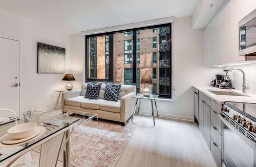 NoMa Hotel | Sophisticated 1BR Deluxe with Rooftop Views, Gym, & Relaxing Pool in NoMa