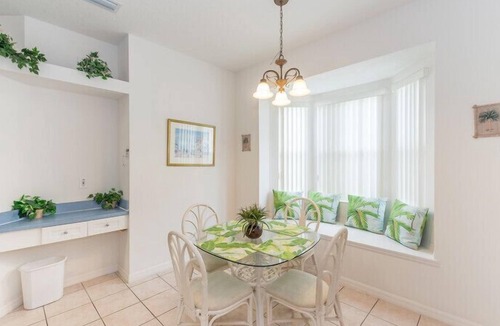 Calabay Parc Villa | South Facing Pool beside palms and grassland. Light, Spacious with Games Room ,