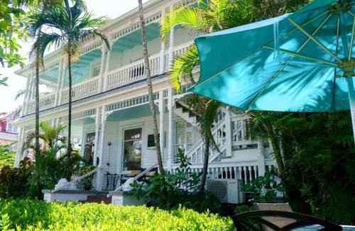 Uptown - Upper Duval Bed & Breakfast | Southernmost Point Guest House & Garden Bar