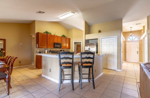 Legacy Park House | Spacious 5BR Family Retreat w Heated Pool, Game Room & Fenced Yard | Sleeps 12 | Near Disney