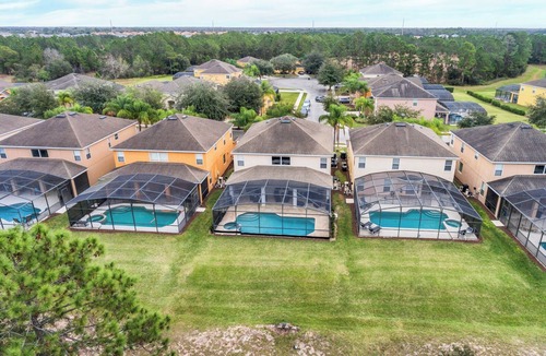 Watersong Villa | Spacious 6-bedroom villa in Davenport with S/W facing pool and outdoor kitchen