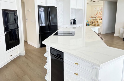 Coquina Key House | Spacious Waterfront Tropical Oasis: Hot Tub, Dock & Turf