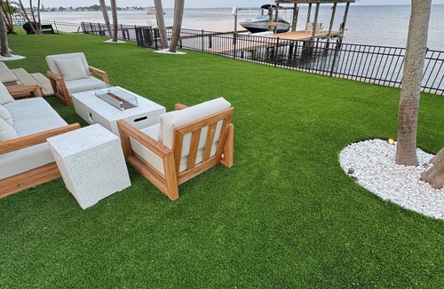 Coquina Key House | Spacious Waterfront Tropical Oasis: Hot Tub, Dock & Turf