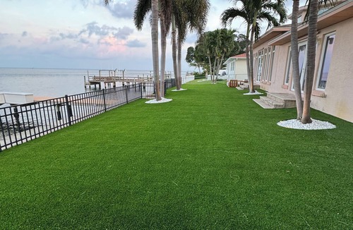 Coquina Key House | Spacious Waterfront Tropical Oasis: Hot Tub, Dock & Turf