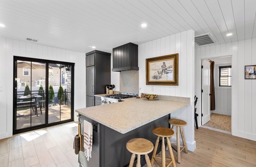 Devon House | Steps to Beach-Water Views-Fire Pit-Pet Friendly-Fenced Yard-Outdoor Shower