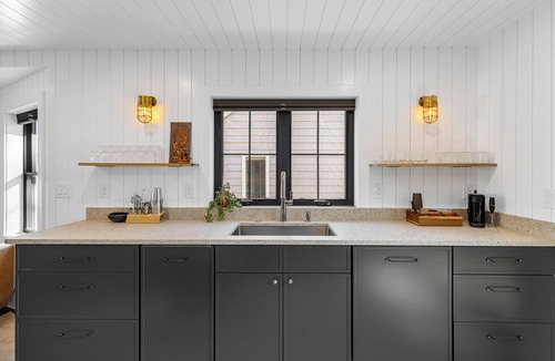 Devon House | Steps to Beach-Water Views-Fire Pit-Pet Friendly-Fenced Yard-Outdoor Shower