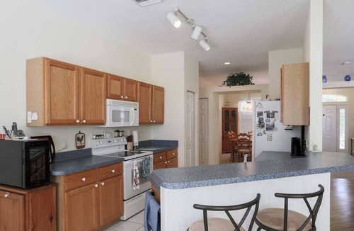 Regency Oaks House | Stunning 3BR lakefront - Pool home in Palmetto - Cranes Galore