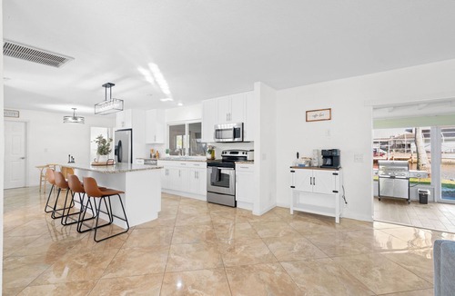 Fort Myers House | Summer Deal: Private Dock, Hot Tub, Kayaks, Fishing Gear & Pet-Friendly