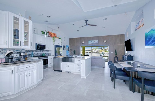 Burnt Store House | Summer discount! Family Oasis-Heated pool and hot tub. Wide canal & manatees