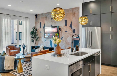 Katie Hill Neighborhood House | Summer rooftop hot tub, karaoke lounge, downtown views near Broadway