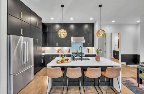 Katie Hill Neighborhood House | Summer rooftop hot tub, karaoke lounge, downtown views near Broadway