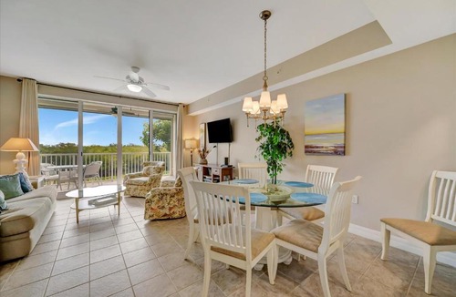 Ruskin House | Sunrise Waterfront 2BR Townhome - Pool & Private Terraces