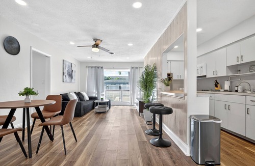 Coral Ridge Isles House | Swaying Palms Unit 1: 2 BR 2 Bath Retreat, Near Beach, Heated Pool, Free Parking