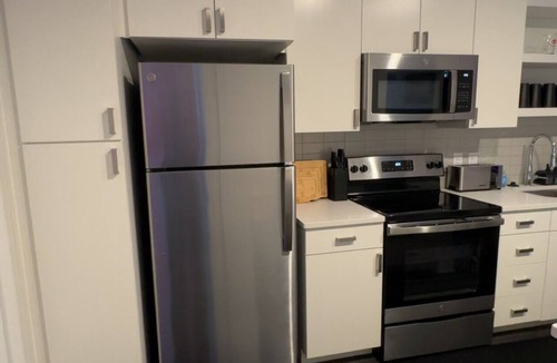 Central Business District Apartment | The 513 Flat II! Pool & River View! Free Gated Parking! Walk to Banks & Stadium!