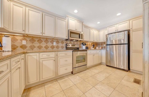 Huddleston House | The full Smith Mountain Lakefront experience: private boat slip, 3 balconies, game room, community pool & beach, propane grill, and pets welcome. No resort fees, ever.