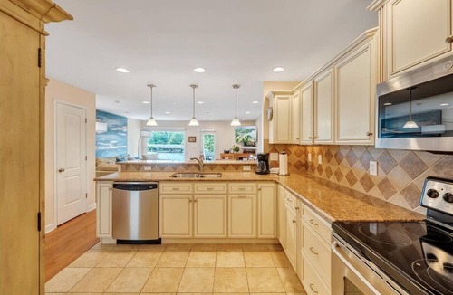 Huddleston House | The full Smith Mountain Lakefront experience: private boat slip, 3 balconies, game room, community pool & beach, propane grill, and pets welcome. No resort fees, ever.