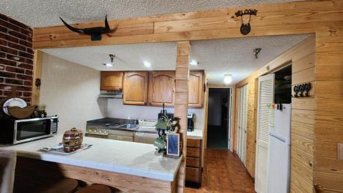 River Ranch Apartment | The Old West Rustic Cabin at River Ranch Resort! 103