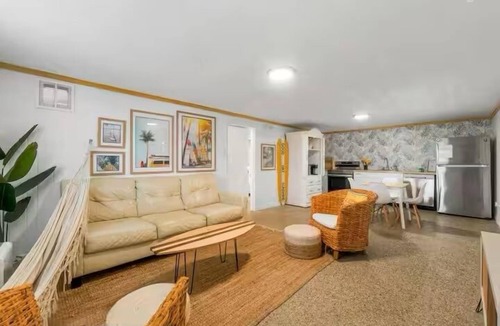 Laguna Beach House | This eclectic beach cottage is just a 3-minute walk to sugar-white sand and turquoise Gulf waters. Tucked in a quiet area yet close to the action, enjoy FREE Wi-Fi, Netflix, parking, coffee, and a private enclosed porch. 🌊✨