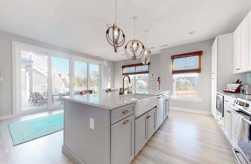 Frankford House | Tidal Walk home with pond views, outdoor pool, decks, fast WiFi, & bikes