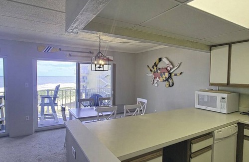 Midtown Ocean City Condo | Traditional, cozy 2 bedroom oceanfront condo with free WiFi, and outdoor pool, and an ocean view located in quiet midtown just steps from the beach!