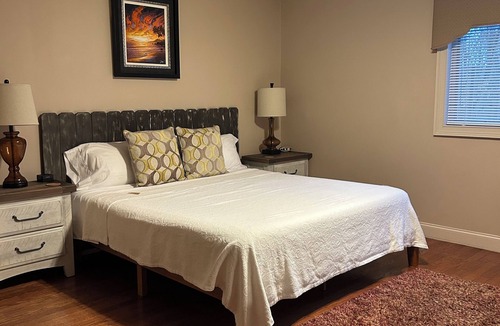 Suwanee House | Tranquility Hideaway in the Woods, King Beds, Pets Allowed, Handicap Accessible