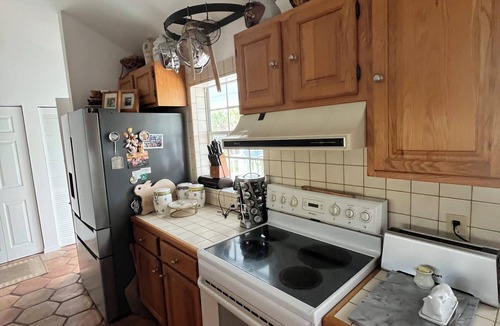 Dinkins Bayou House | TREE HOUSE a charming 2-bedroom home on wonderful Sanibel Island. Beach close.