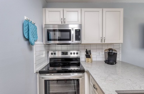 Miramar Beach Condo | Trendy condo with full kitchen, shared pool, and easy beach access