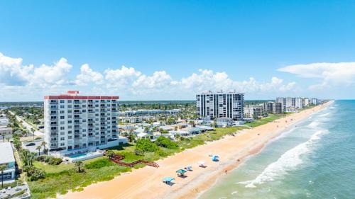 Seawinds Condo Apartment | Updated direct oceanfront corner 2/2 with stunning beach views, a heated pool, and parking garage